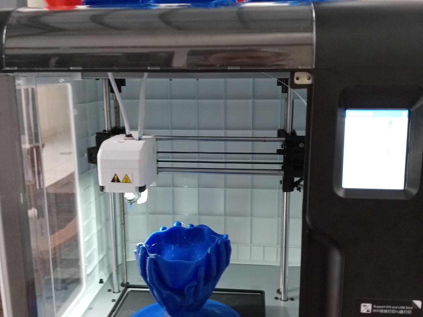 A 3D printer partway through a print